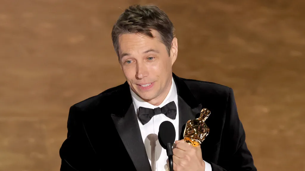 HOLLYWOOD, CALIFORNIA - MARCH 02: Sean Baker accepts the Best Writing (Original Screenplay) award for "Anora" onstage during the 97th Annual Oscars at Dolby Theatre on March 02, 2025 in Hollywood, California.  (Photo by Kevin Winter/Getty Images)